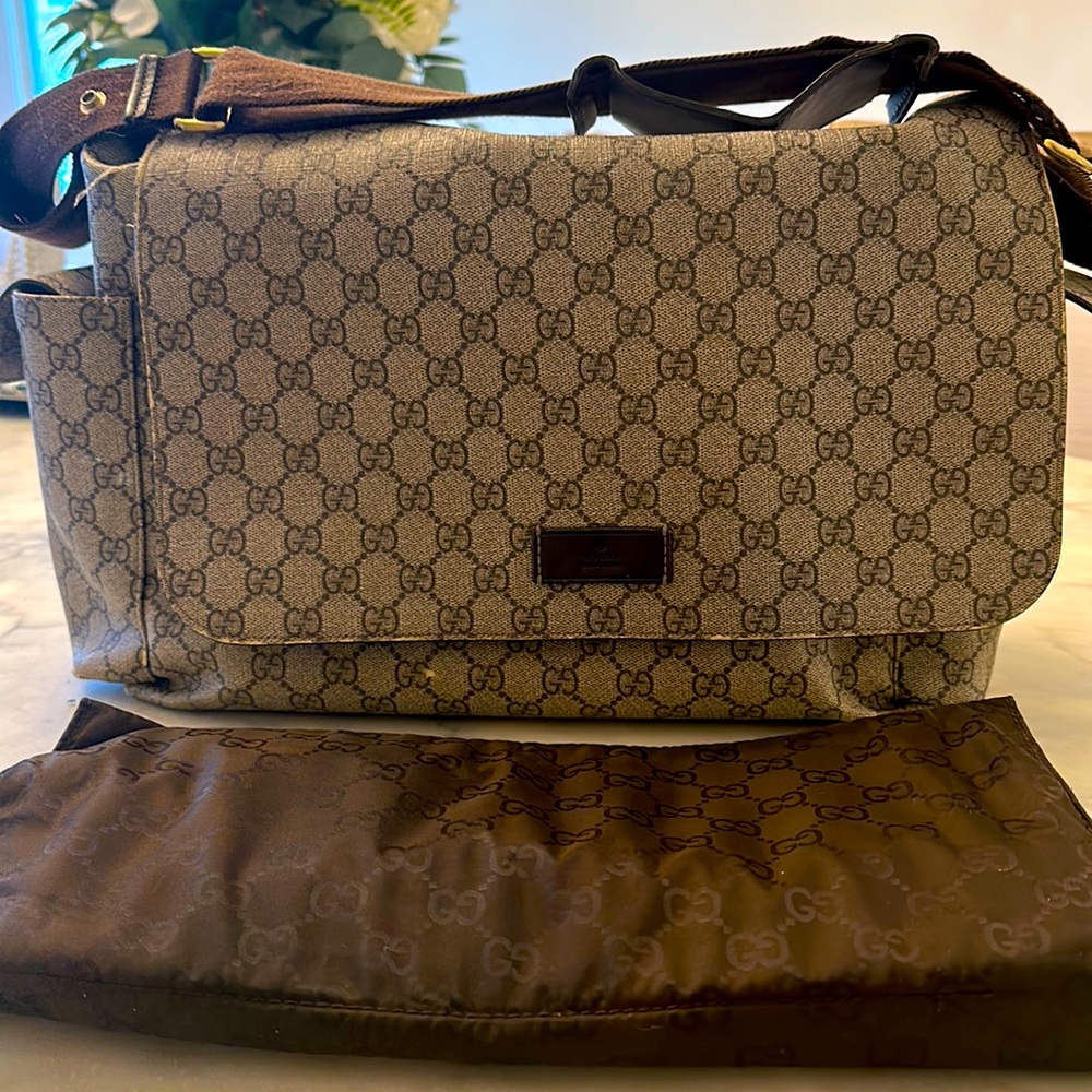 Gucci diaper bag with original Gucci changing pad